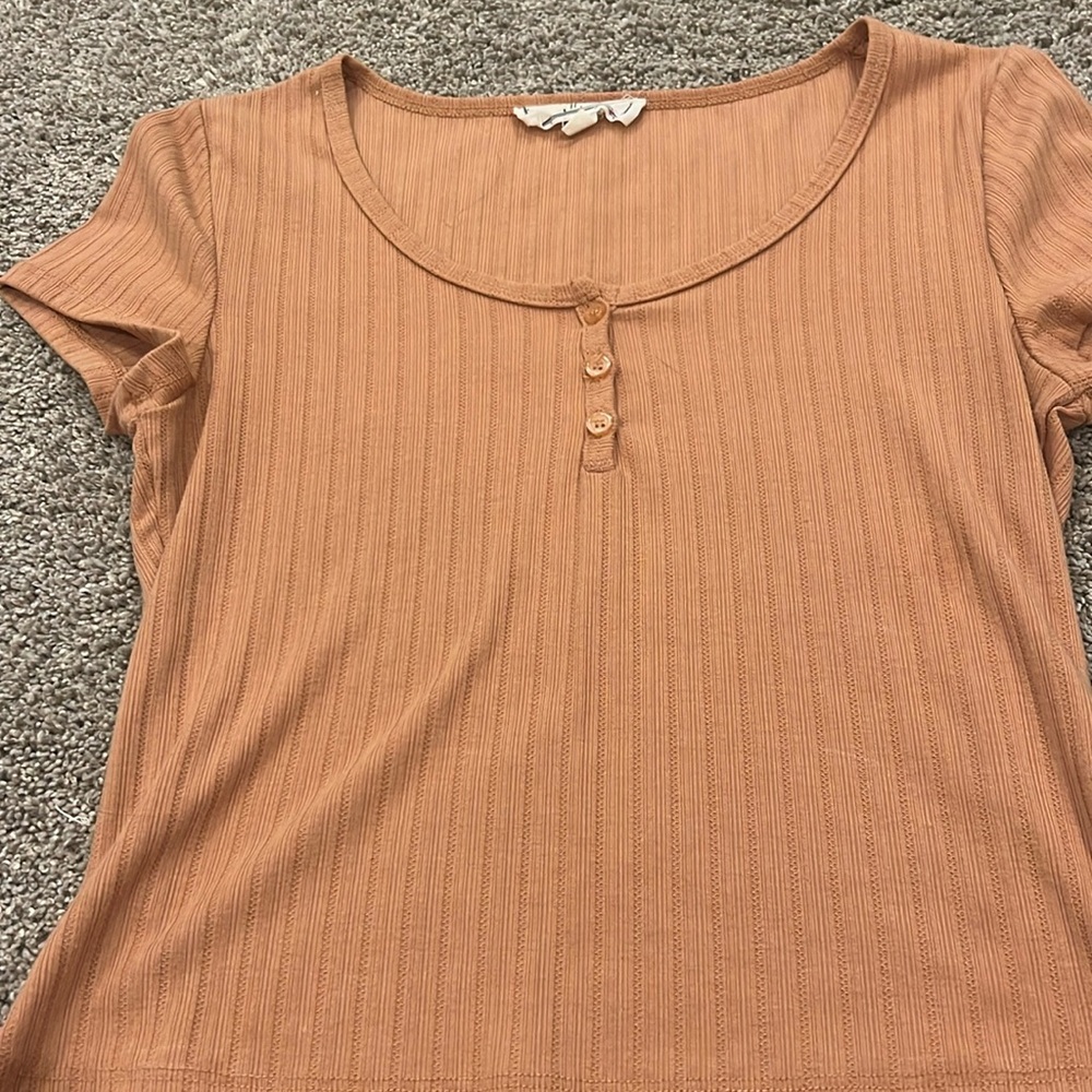 rust orange baby tee